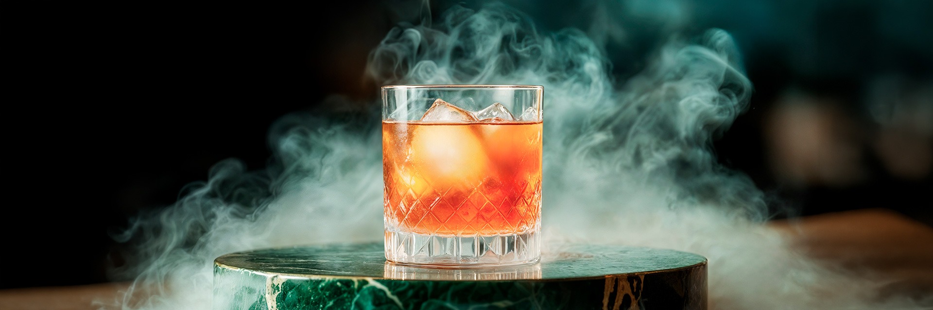 Signature Smoked Whiskey Cocktail Experience – Roatan Provision Premium whiskey cocktail with ice and smoky presentation from Roatan Provision
