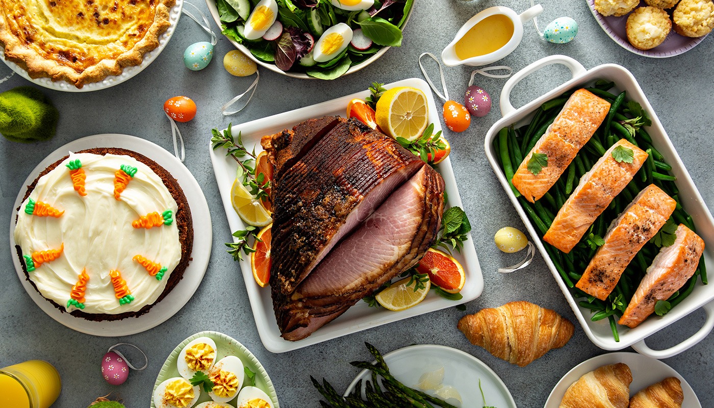 Seasonal food selection featuring roasted meats, fresh vegetables and festive dishes at Roatan Provision.